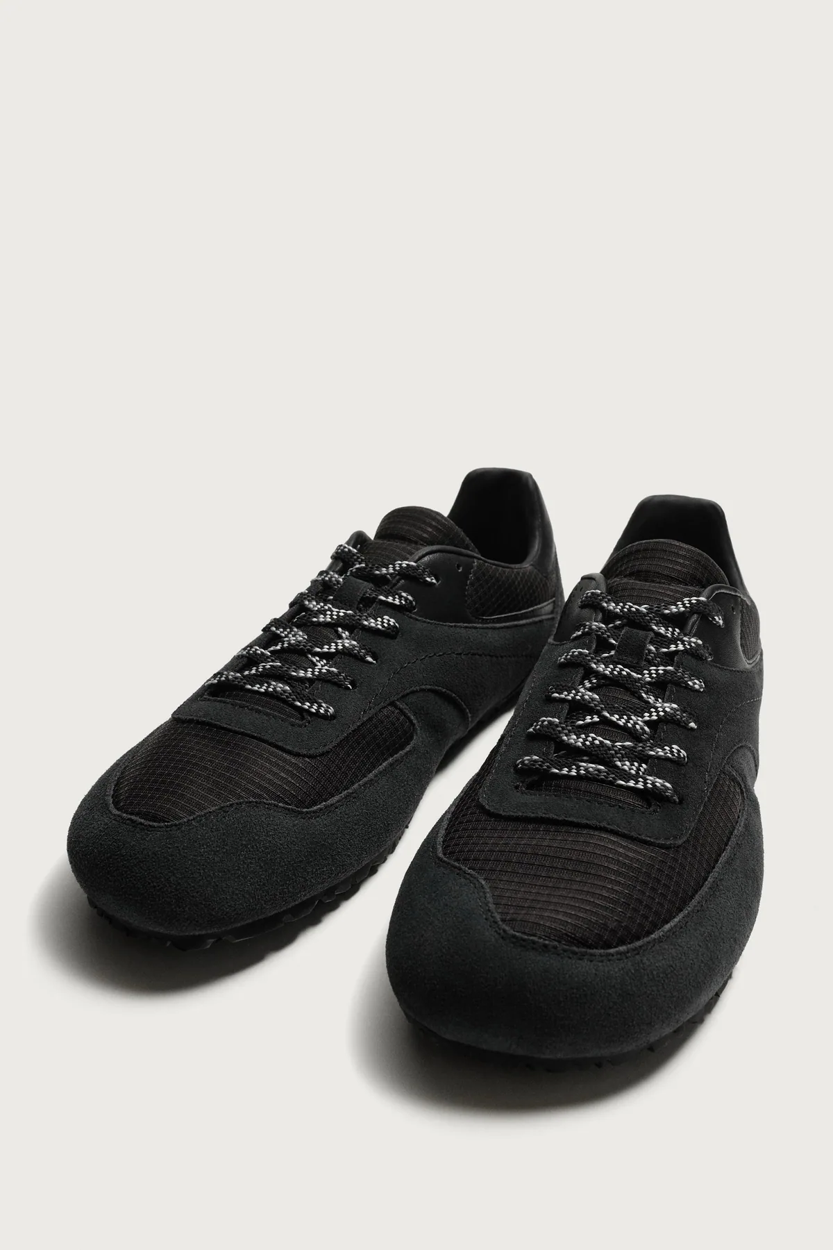 Zara Barefoot Trainers - Black, black pair, three-quarter view